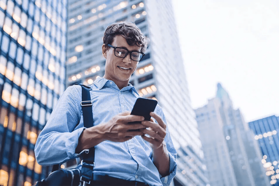 man looking at phone