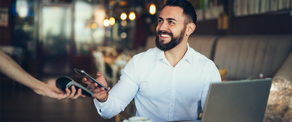 Man making a mobile payment