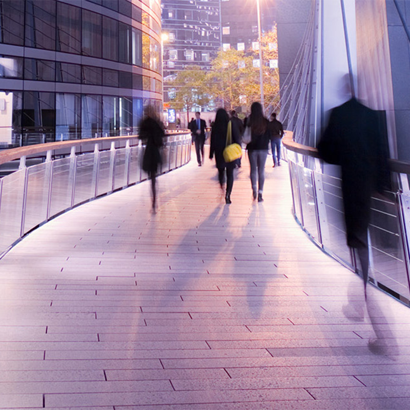 People walking on a sidewalk