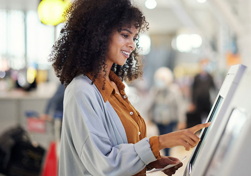 woman at kiosk in store