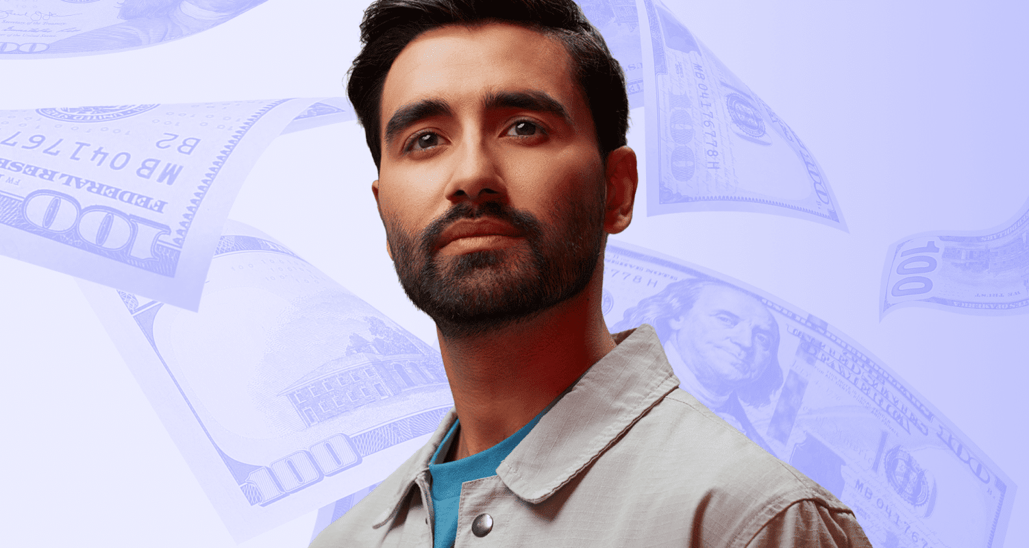 man staring straight ahead with a background of hundred dollar bills