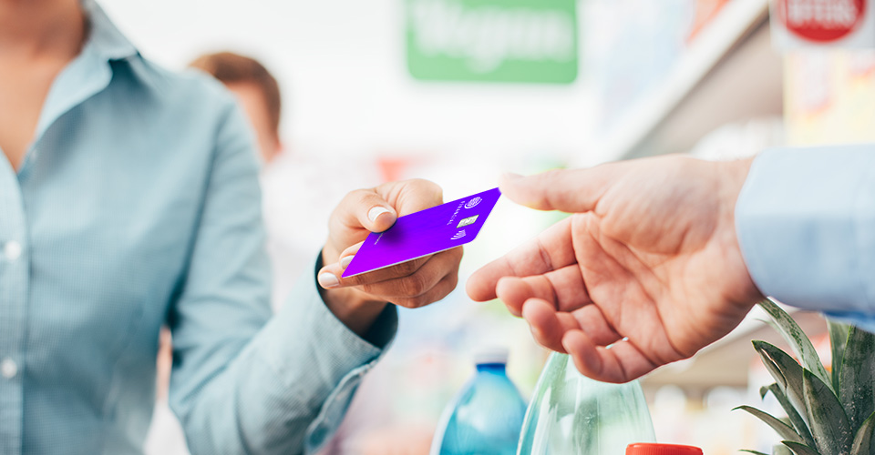 instantly issued debit card handed to customer