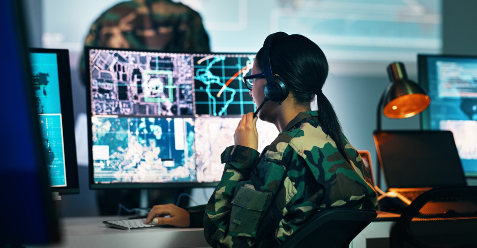Military command center, computer screen and woman in surveillance, headset and tech for communication. Security, world satellite map and soldier at monitor in army office at government control room.