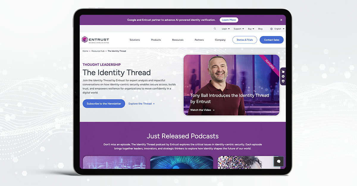 Tablet screen displaying the Entrust website page titled ‘The Identity Thread,’ featuring a video thumbnail and sections promoting newsletters and podcasts