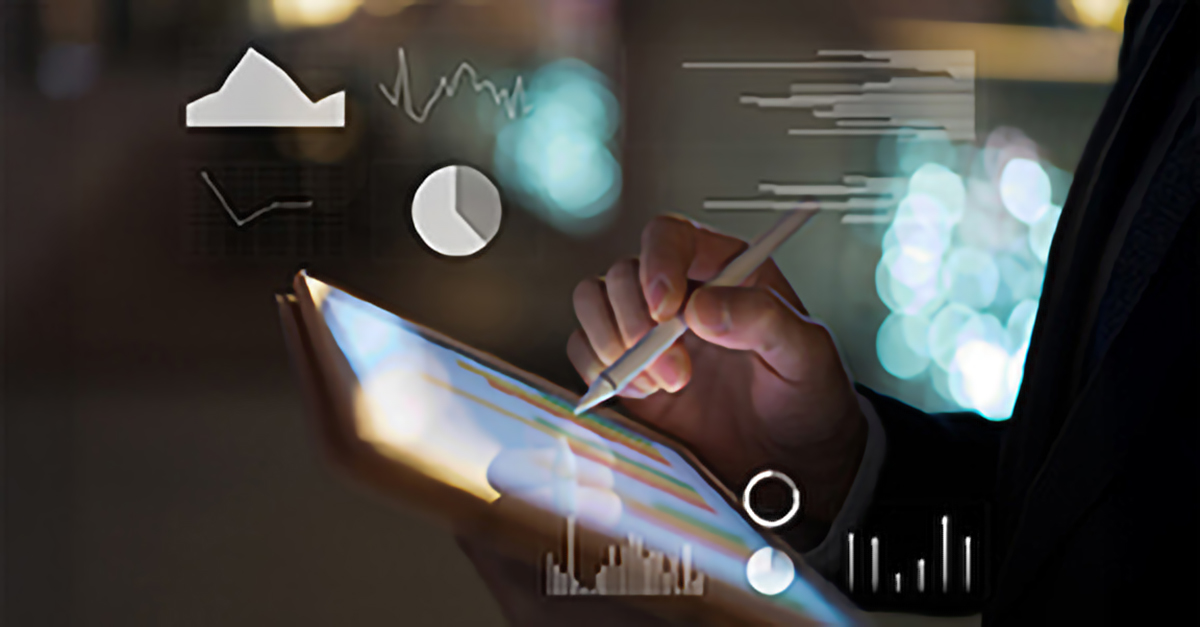 Person using a stylus on a tablet with floating digital charts and graphs