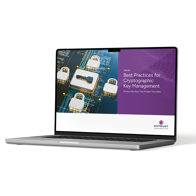 Laptop displaying ebook cover with digital key and circuit lock graphics, titled “Best Practices for Cryptographic Key Management