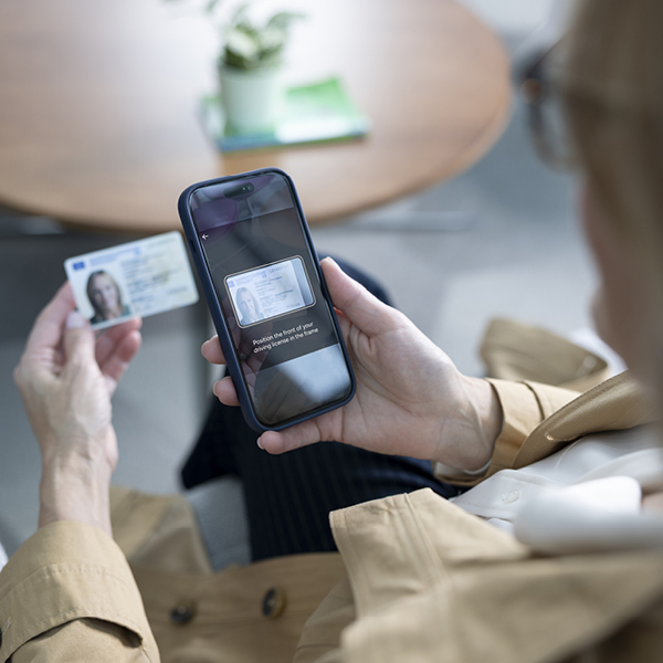 Mobile phone scanning an ID card for verification