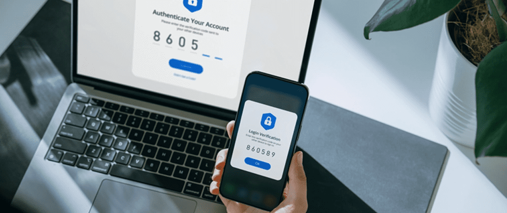 hand holding phone with login verification screen