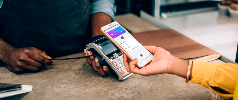 Person scanning phone with Digital Card Solution