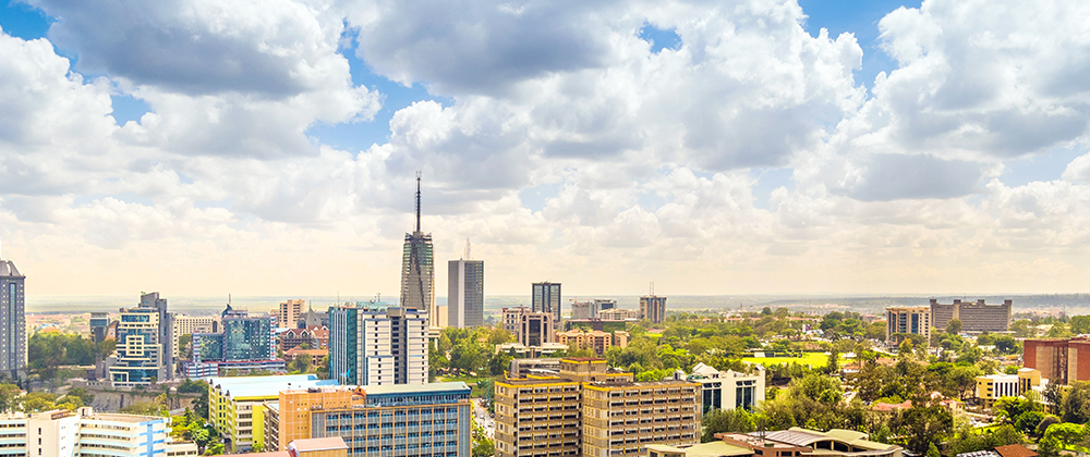 a view of a city with some buildings and trees
