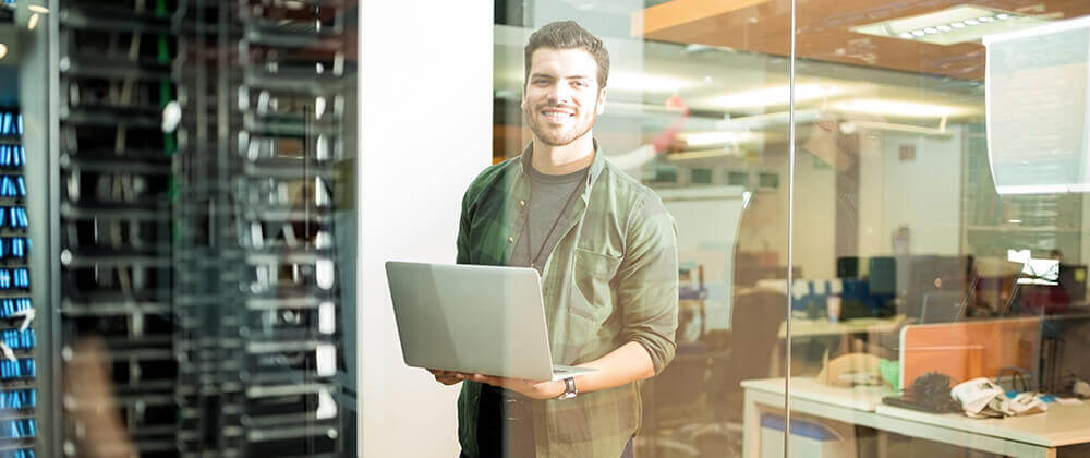 Man holding laptop