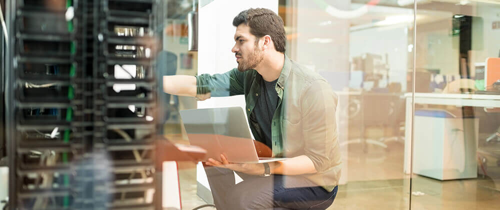 Man holding laptop